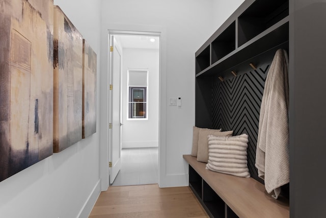 317 Rusk St, Roanoke, TX 76262 - mudroom featuring light wood-style flooring and baseboards