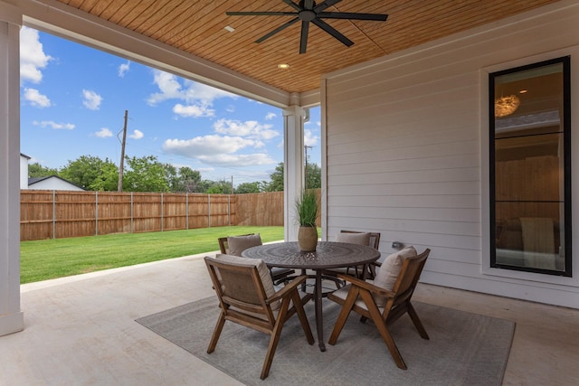 317 Rusk St, Roanoke, TX 76262 - fenced backyard featuring a ceiling fan, outdoor dining area, and a patio area