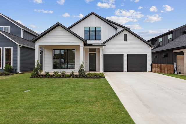 317 Rusk St, Roanoke, TX 76262 - modern inspired farmhouse featuring driveway, a front yard, board and batten siding, and a garage