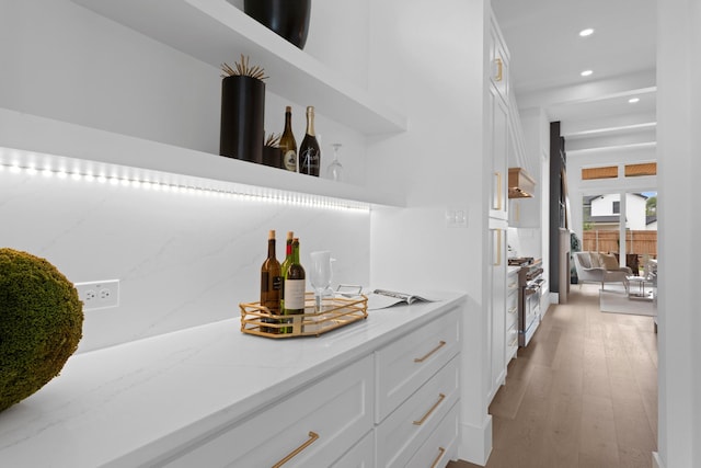 317 Rusk St, Roanoke, TX 76262 - indoor dry bar featuring high end stainless steel range oven, recessed lighting, and light wood-style flooring