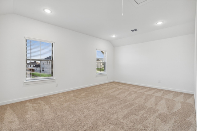 238 Twin View Vista Dr, Lavon, TX 75166 - empty room featuring vaulted ceiling, light colored carpet, baseboards, attic access, and recessed lighting