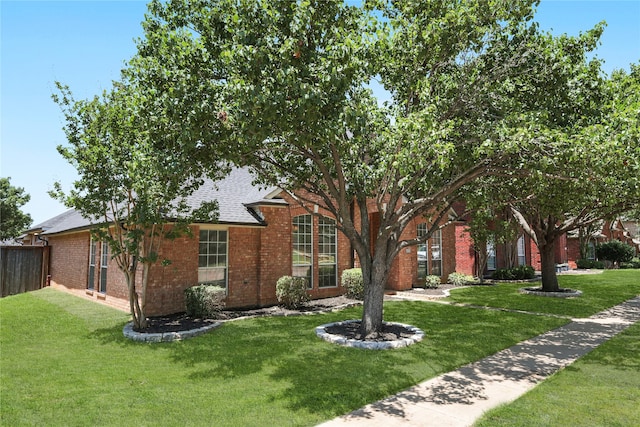 4321 Boca Raton Dr, The Colony, TX 75056 - view of front of home featuring brick siding and a shingled roof