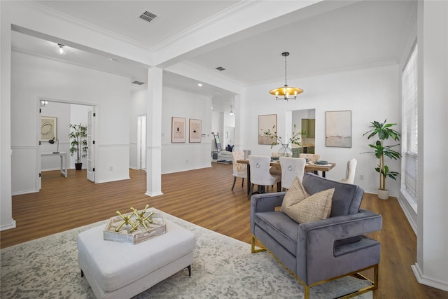 4321 Boca Raton Dr, The Colony, TX 75056 - living room with ornamental molding, wood finished floors, decorative columns, and baseboards
