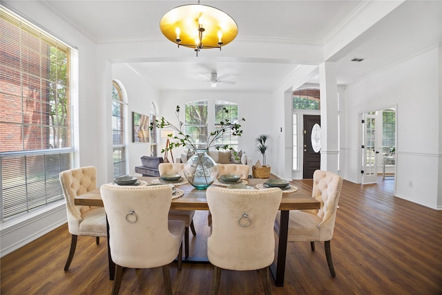 4321 Boca Raton Dr, The Colony, TX 75056 - dining area featuring plenty of natural light, dark wood-style flooring, baseboards, and crown molding