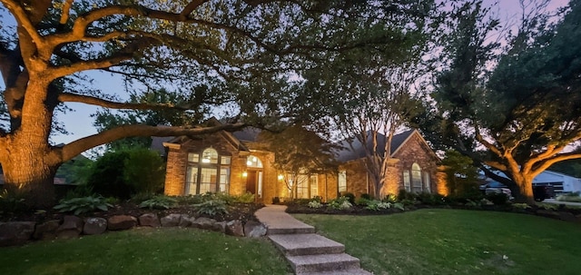 2601 Clublake Trl, Mckinney, TX 75072 - view of front facade with a front yard and stone siding