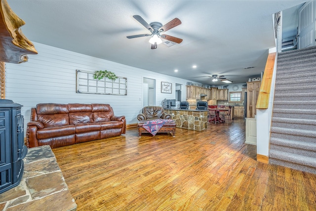 5855 Fm 1377, Princeton, TX 75407 - living room with ceiling fan, stairway, wood finished floors, and baseboards