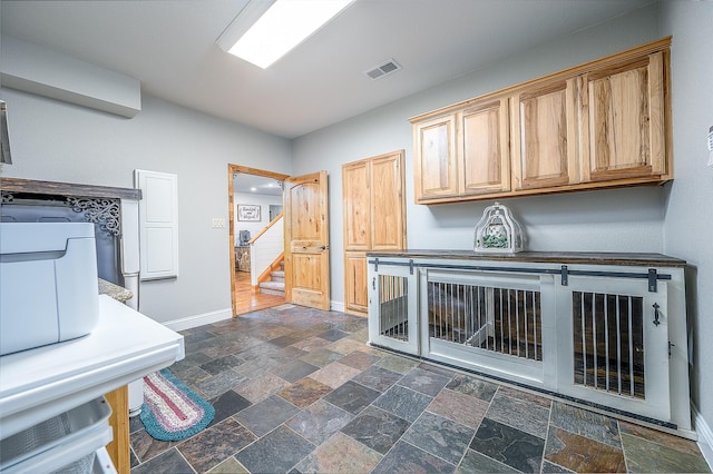 5855 Fm 1377, Princeton, TX 75407 - washroom with dark stone finish flooring and baseboards