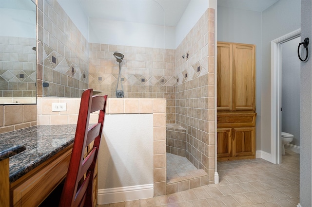 5855 Fm 1377, Princeton, TX 75407 - bathroom featuring vanity, a walk in shower, tile patterned flooring, and toilet