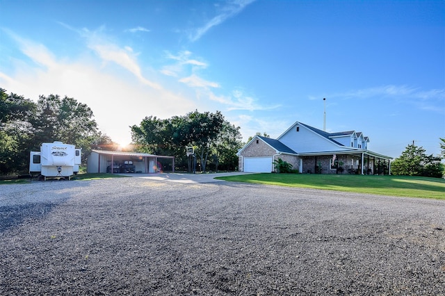5855 Fm 1377, Princeton, TX 75407 - view of front facade with a carport, driveway, a front lawn, and a garage