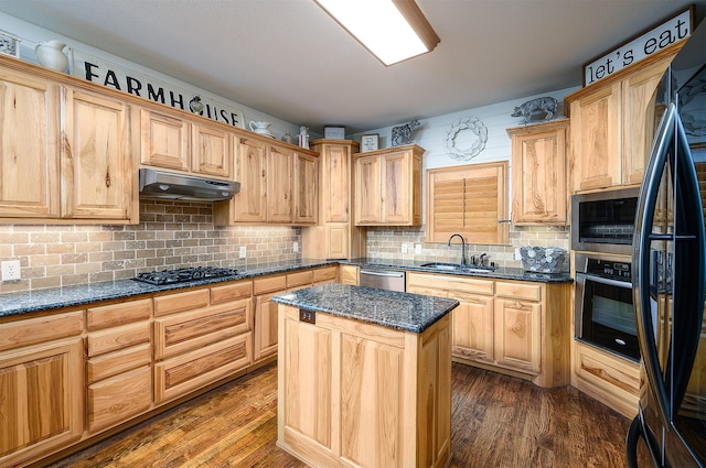 5855 Fm 1377, Princeton, TX 75407 - kitchen with black appliances, a sink, under cabinet range hood, dark wood-type flooring, and a kitchen island