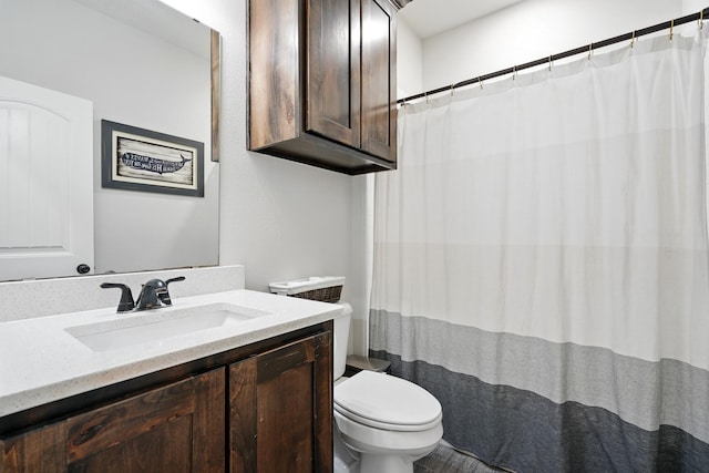 120 Oak Hill Rd, Tuscola, TX 79562 - full bathroom featuring toilet, vanity, and a shower with curtain
