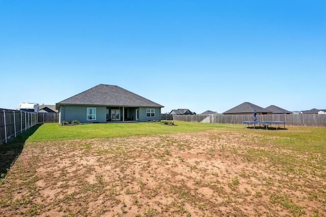 120 Oak Hill Rd, Tuscola, TX 79562 - back of house with a trampoline