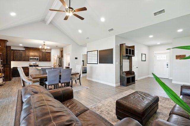 120 Oak Hill Rd, Tuscola, TX 79562 - living area featuring a chandelier, beam ceiling, light wood-type flooring, a ceiling fan, and recessed lighting