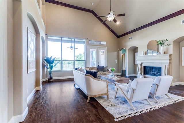 2028 Sterling Trace Dr, Keller, TX 76248 - living room featuring a ceiling fan, high vaulted ceiling, crown molding, baseboards, and arched walkways