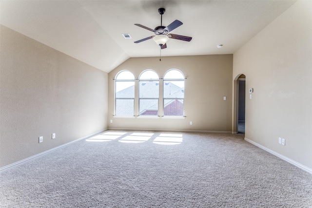 2028 Sterling Trace Dr, Keller, TX 76248 - spare room featuring arched walkways, ceiling fan, carpet flooring, vaulted ceiling, and baseboards