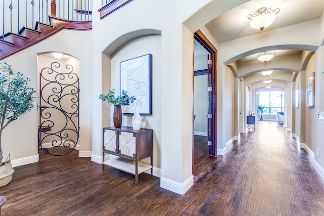 2028 Sterling Trace Dr, Keller, TX 76248 - entryway featuring arched walkways, wood finished floors, and baseboards