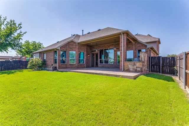 2028 Sterling Trace Dr, Keller, TX 76248 - back of property with brick siding, a patio area, and roof with shingles