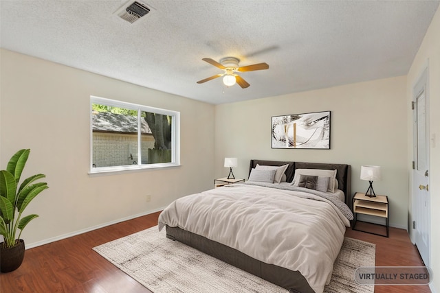 2111 Chippendale Dr, Mckinney, TX 75071 - bedroom featuring wood finished floors, baseboards, and ceiling fan
