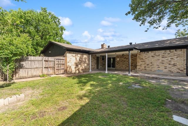 2111 Chippendale Dr, Mckinney, TX 75071 - rear view of property with brick siding, a chimney, and a patio
