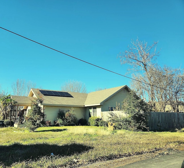225 E Oneal St, Wills Point, TX 75169 - view of property exterior featuring roof mounted solar panels