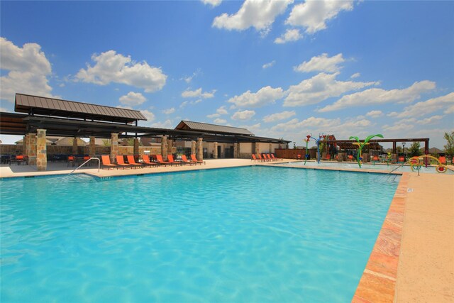 736 Hidden Feather Dr, Lavon, TX 75166 - community pool with a patio