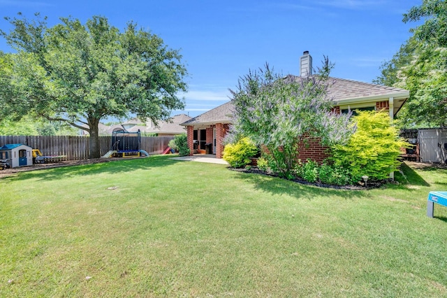 3214 Eagle Ln, Midlothian, TX 76065 - view of yard with a trampoline