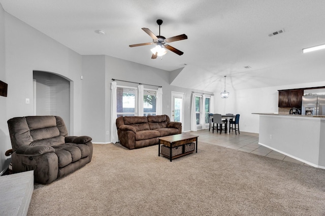 3214 Eagle Ln, Midlothian, TX 76065 - living room with a ceiling fan, light colored carpet, lofted ceiling, baseboards, and light tile patterned floors