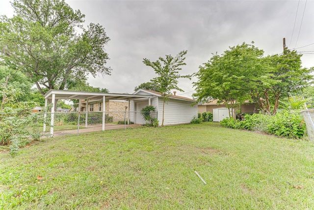 307 E Rio Grande St, Garland, TX 75041 - view of yard featuring a carport