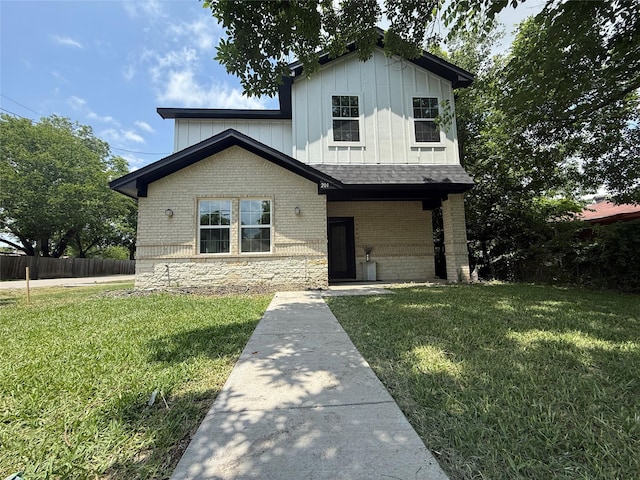 201 E 10th St, Kaufman, TX 75142 - view of front of home featuring brick siding, board and batten siding, and a shingled roof