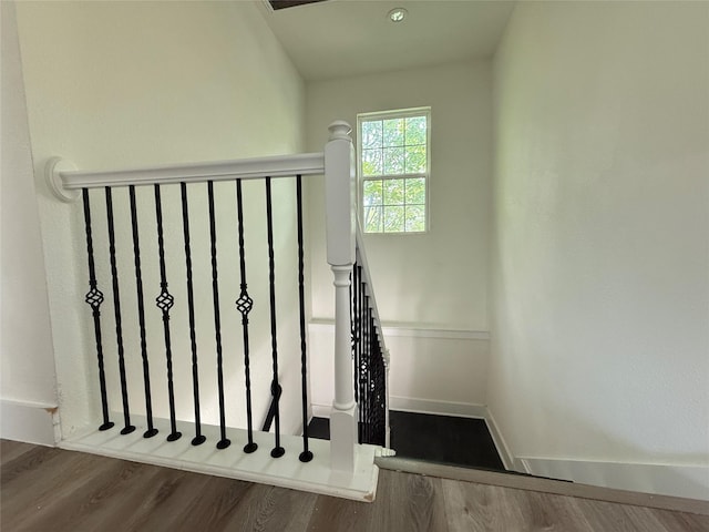 201 E 10th St, Kaufman, TX 75142 - stairs with wood finished floors and baseboards