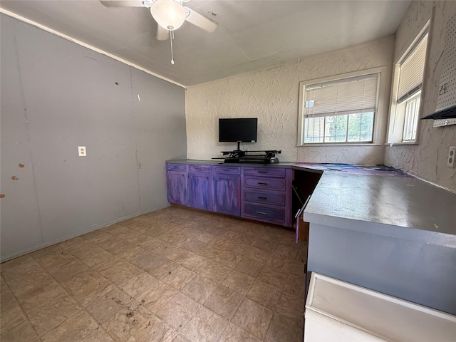 201 E 10th St, Kaufman, TX 75142 - kitchen featuring a ceiling fan