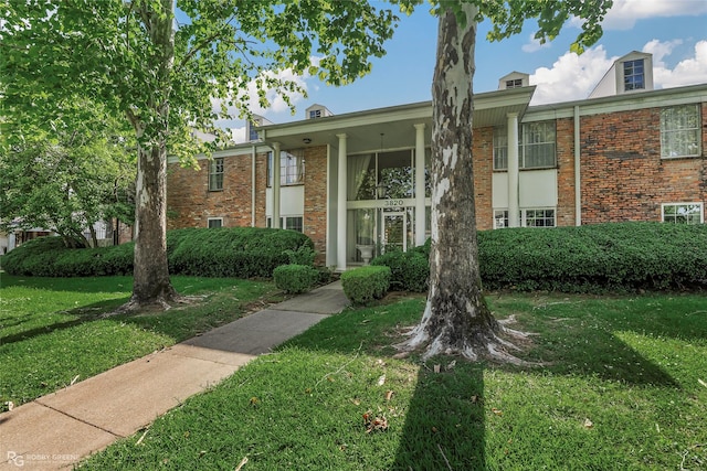 3820 Fairfield Ave Unit 113, Shreveport, LA 71104 - townhome / multi-family property with a front lawn and brick siding