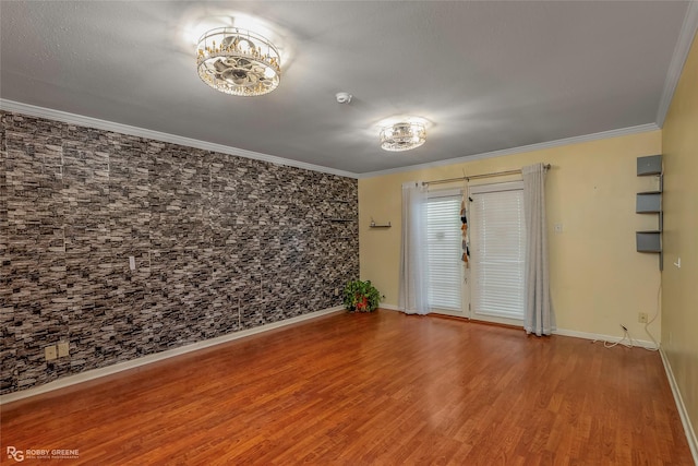 3820 Fairfield Ave Unit 113, Shreveport, LA 71104 - spare room with wood finished floors, baseboards, and ornamental molding