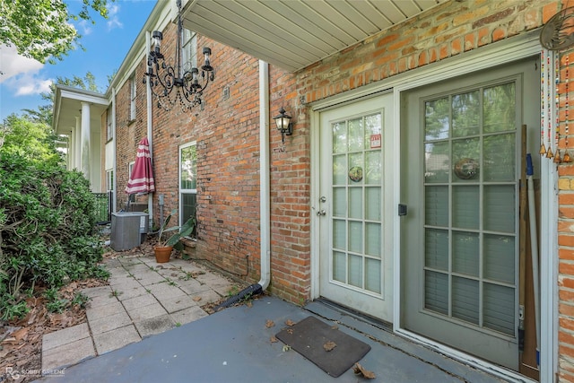 3820 Fairfield Ave Unit 113, Shreveport, LA 71104 - property entrance with brick siding and cooling unit