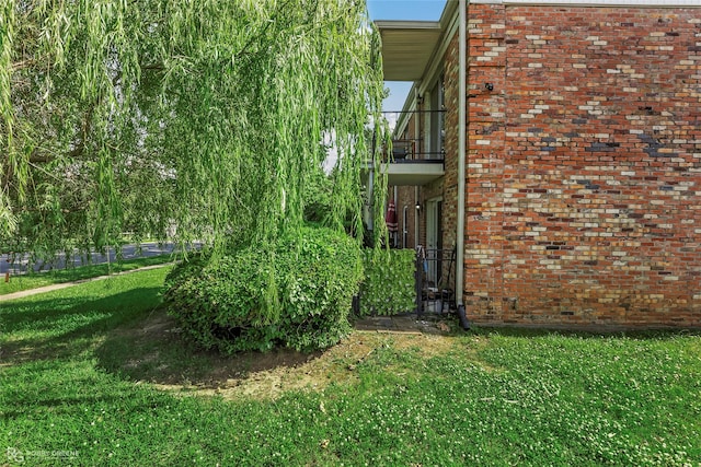 3820 Fairfield Ave Unit 113, Shreveport, LA 71104 - view of yard with a balcony and a gate