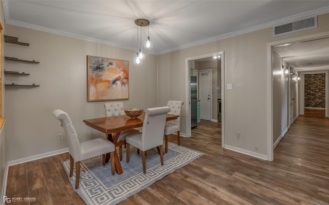 3820 Fairfield Ave Unit 113, Shreveport, LA 71104 - dining area with wood finished floors, ornamental molding, and baseboards
