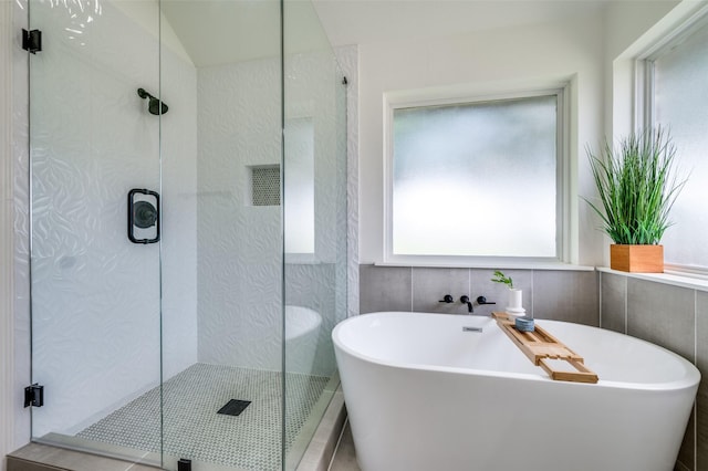 212 Cory Ct, Krum, TX 76249 - full bathroom featuring healthy amount of natural light, a freestanding tub, and a shower stall
