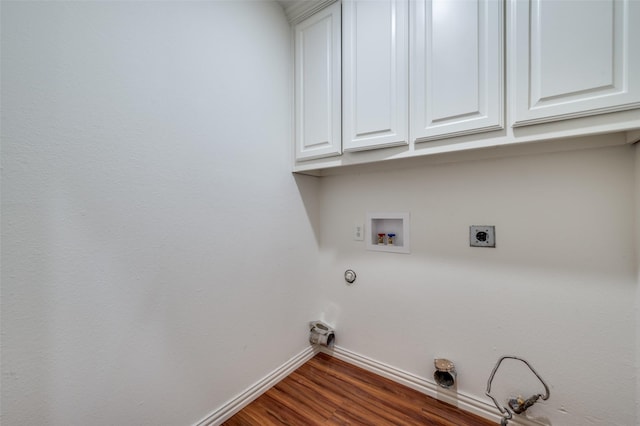 212 Cory Ct, Krum, TX 76249 - laundry room featuring gas dryer hookup, baseboards, hookup for a washing machine, electric dryer hookup, and cabinet space