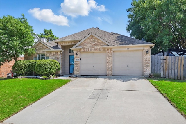 4408 Sunny Oak Ln, Corinth, TX 76208 - view of front of property with driveway, a garage, brick siding, and a shingled roof