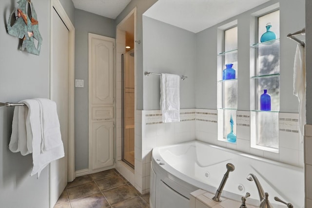2739 Timberleaf Dr, Carrollton, TX 75006 - bathroom with a stall shower, a jetted tub, tile patterned flooring, and plenty of natural light