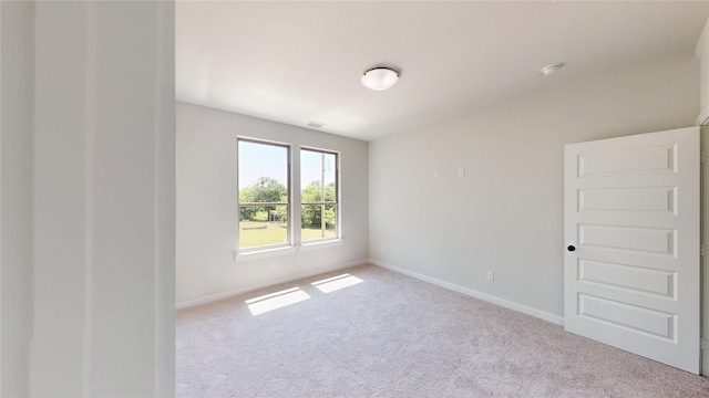 6857 Rutland Dr, Arlington, TX 76002 - unfurnished room featuring carpet flooring, baseboards, and a smoke detector