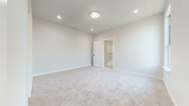 6857 Rutland Dr, Arlington, TX 76002 - unfurnished bedroom featuring light colored carpet, recessed lighting, baseboards, and multiple windows