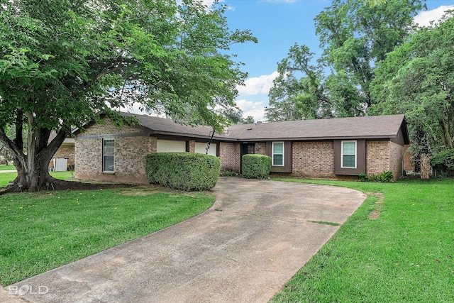 2020 Venus Dr, Bossier City, LA 71112 - single story home featuring a garage, brick siding, driveway, a front yard, and a shingled roof