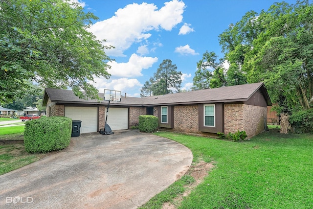 2020 Venus Dr, Bossier City, LA 71112 - view of front facade with a garage, brick siding, a front lawn, and driveway