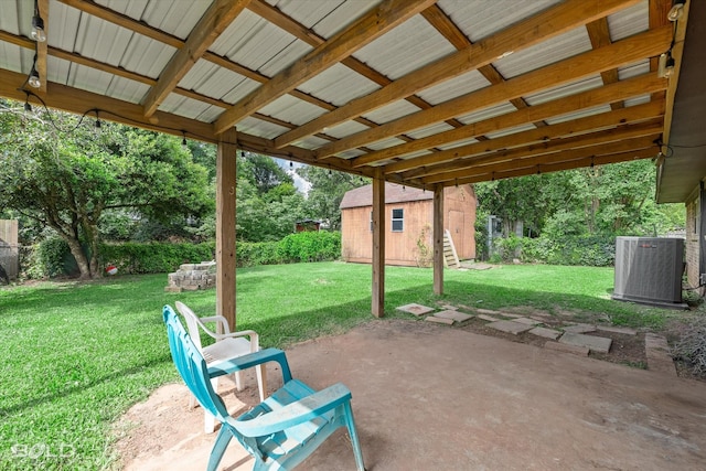 2020 Venus Dr, Bossier City, LA 71112 - view of patio / terrace with cooling unit and an outbuilding