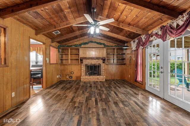 2020 Venus Dr, Bossier City, LA 71112 - unfurnished living room with dark wood-type flooring, wooden walls, wooden ceiling, a ceiling fan, and a brick fireplace