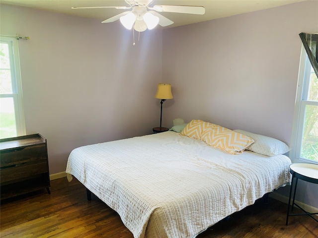 2009 W Way, Garland, TX 75042 - bedroom with wood finished floors, baseboards, and ceiling fan