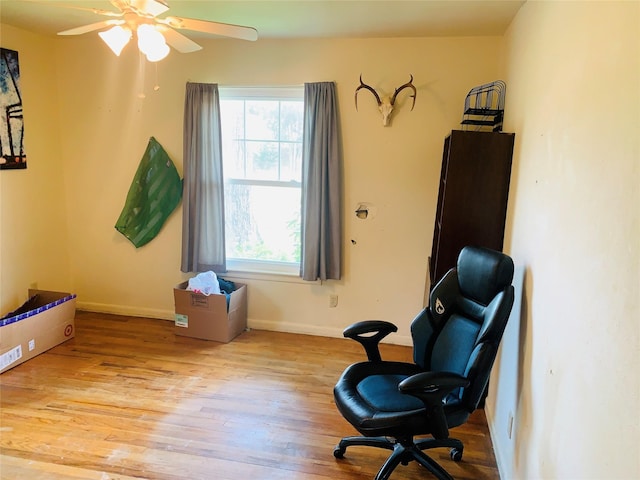 2009 W Way, Garland, TX 75042 - sitting room featuring wood finished floors, baseboards, and ceiling fan