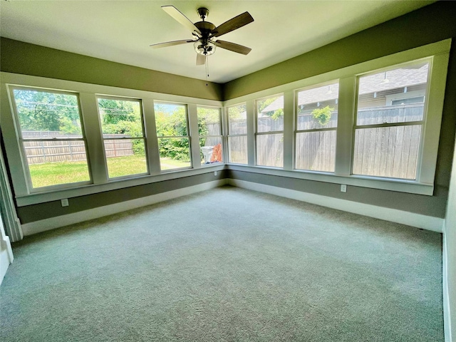 714 Beacon, Dallas, TX 75214 - unfurnished sunroom with baseboards and carpet floors
