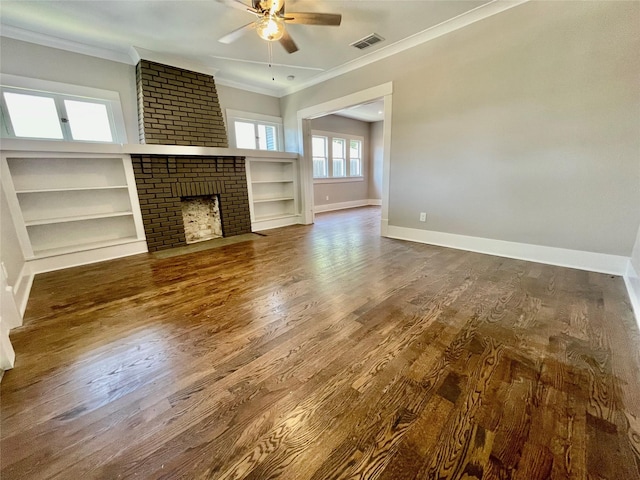 714 Beacon, Dallas, TX 75214 - unfurnished living room featuring a ceiling fan, crown molding, wood finished floors, baseboards, and a brick fireplace
